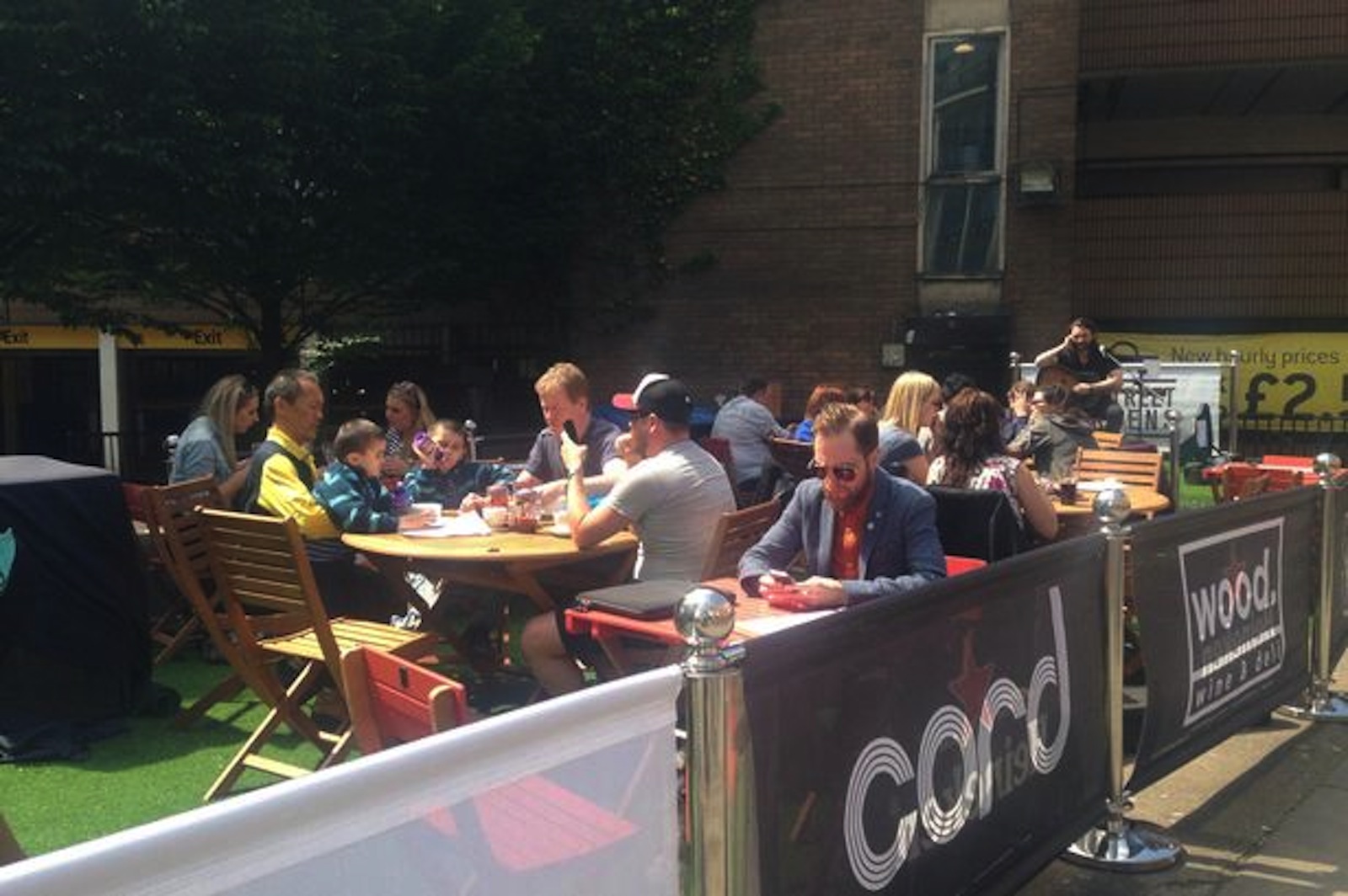 Vibrant outdoor venue in Tib Street Garden for casual networking and social events.