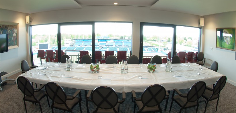 Executive Boxes at StoneX Stadium with elegant table setup for corporate meetings.