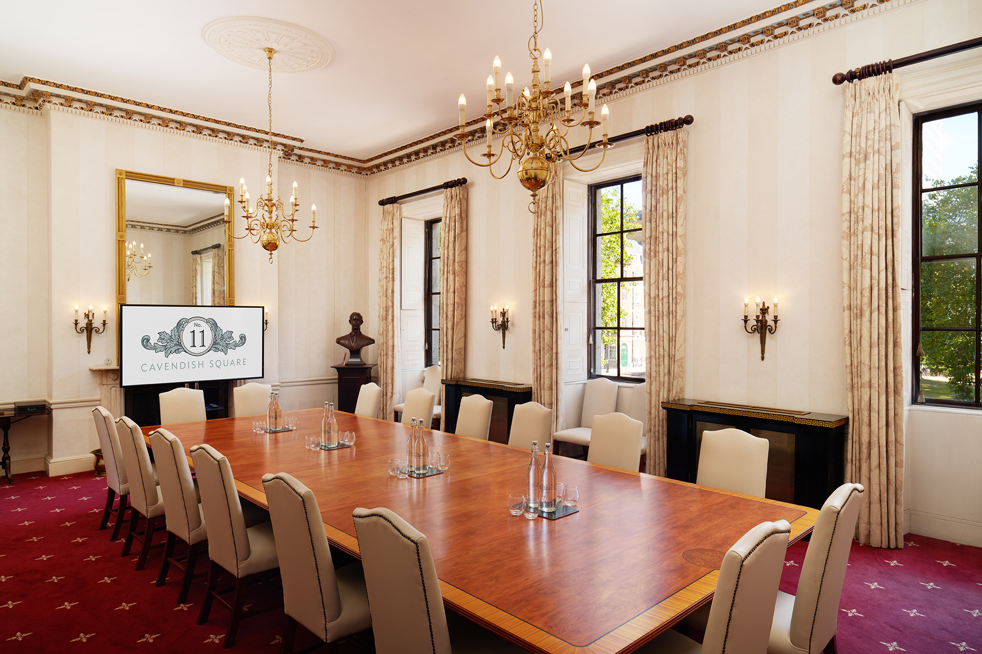 Elegant meeting room with wooden table, ideal for corporate meetings and executive retreats.