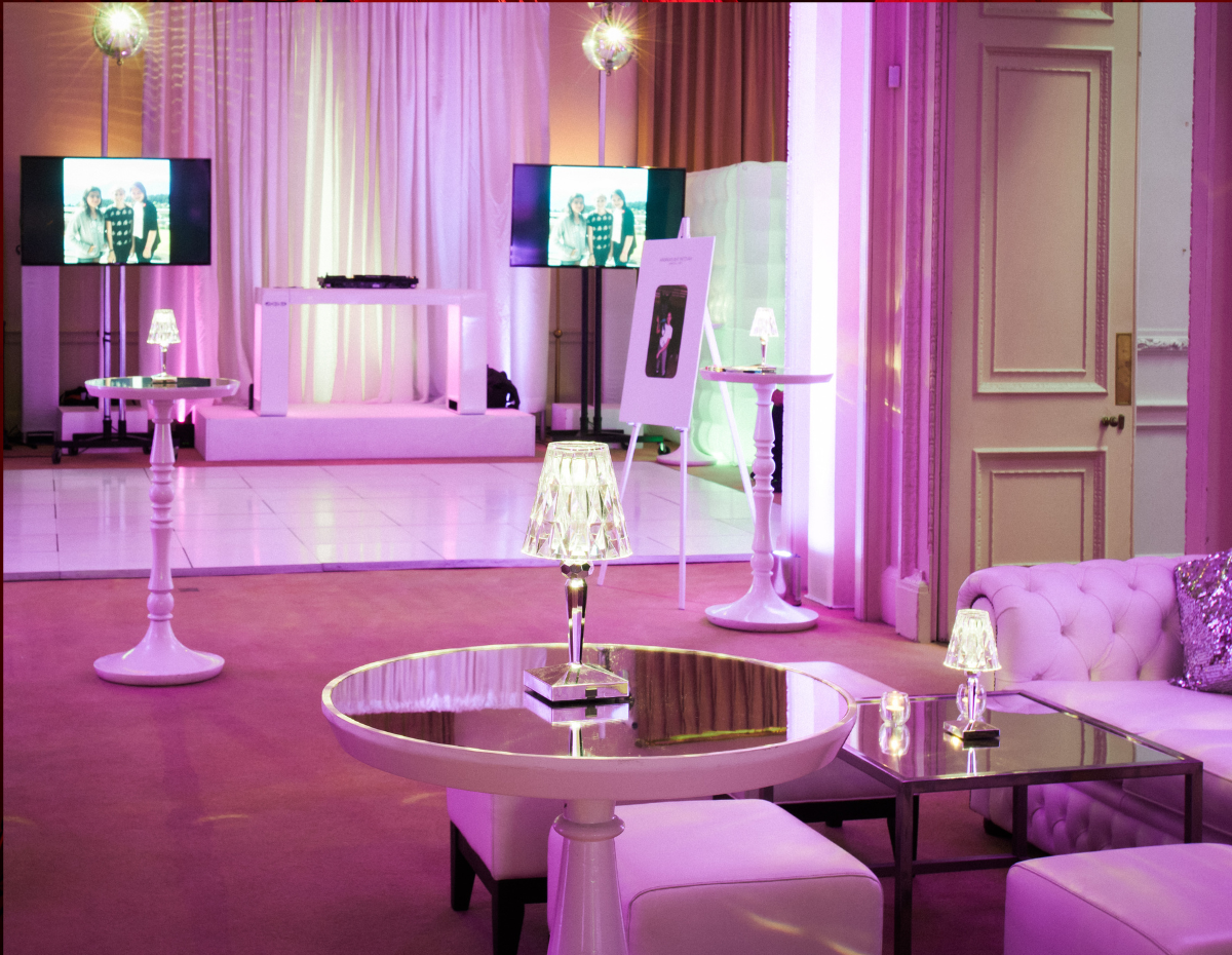 Elegant event space in Kent House Knightsbridge with pink lighting for corporate gatherings.