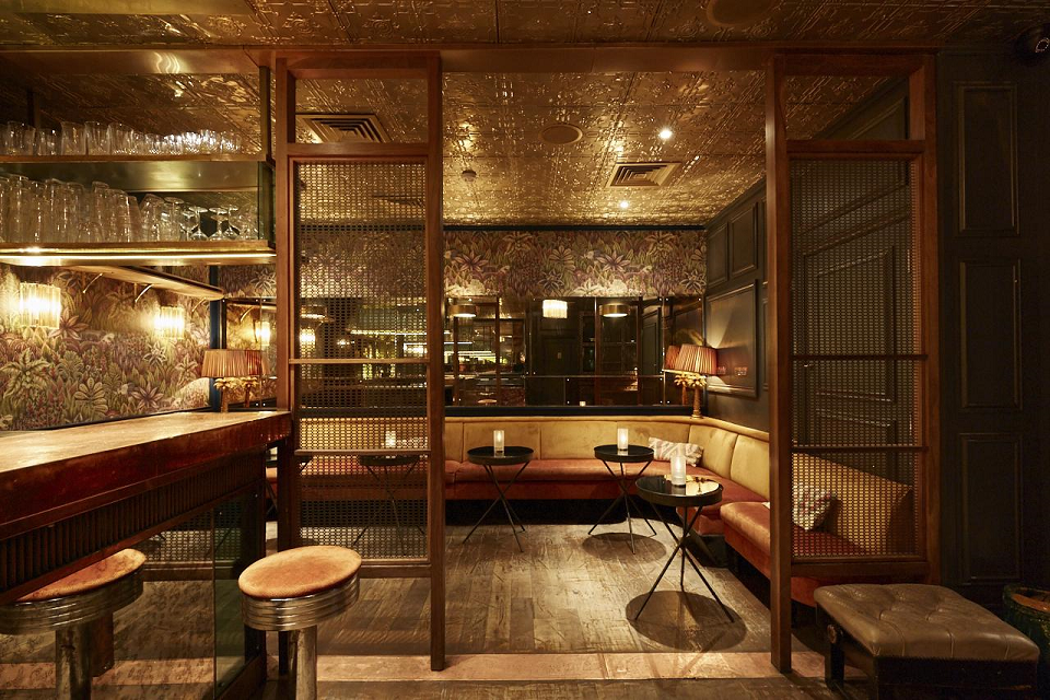 Stylish venue with warm lighting, ideal for networking events and cocktail receptions.