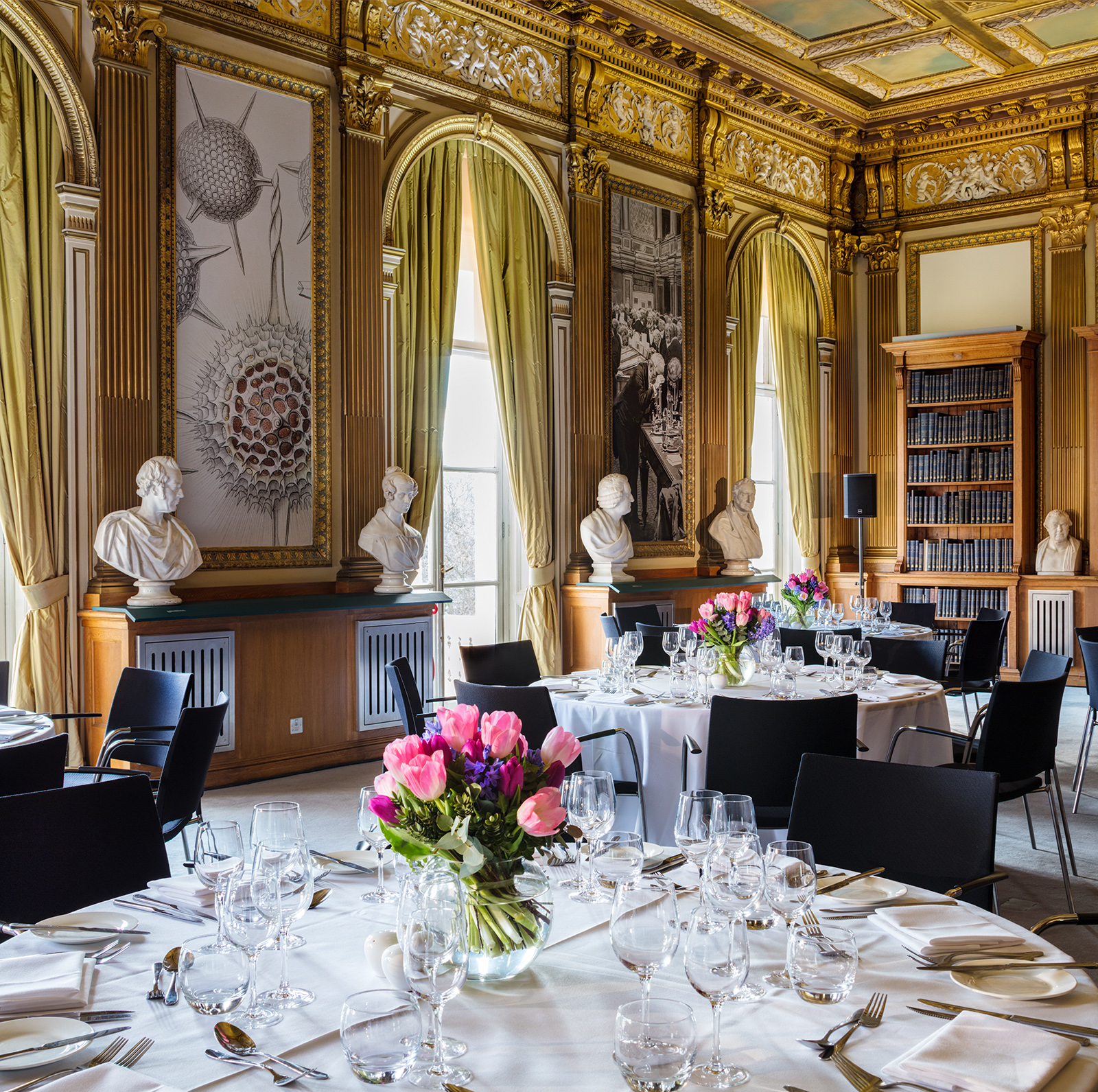 Elegant dining setup in Royal Society's Wolfson Room for upscale events and corporate dinners.