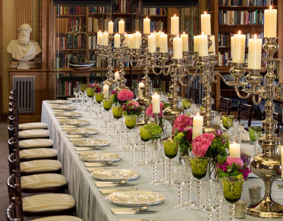 Elegant dining setup with floral centerpieces for formal events at The Royal Society.