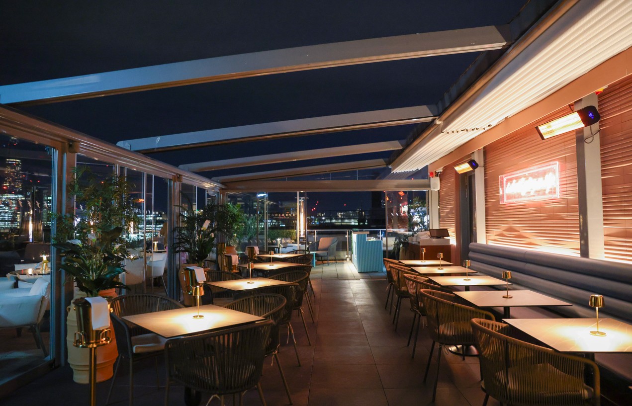 Chic Sabine Rooftop Bar at Leonardo Royal Hotel London for upscale events and gatherings.