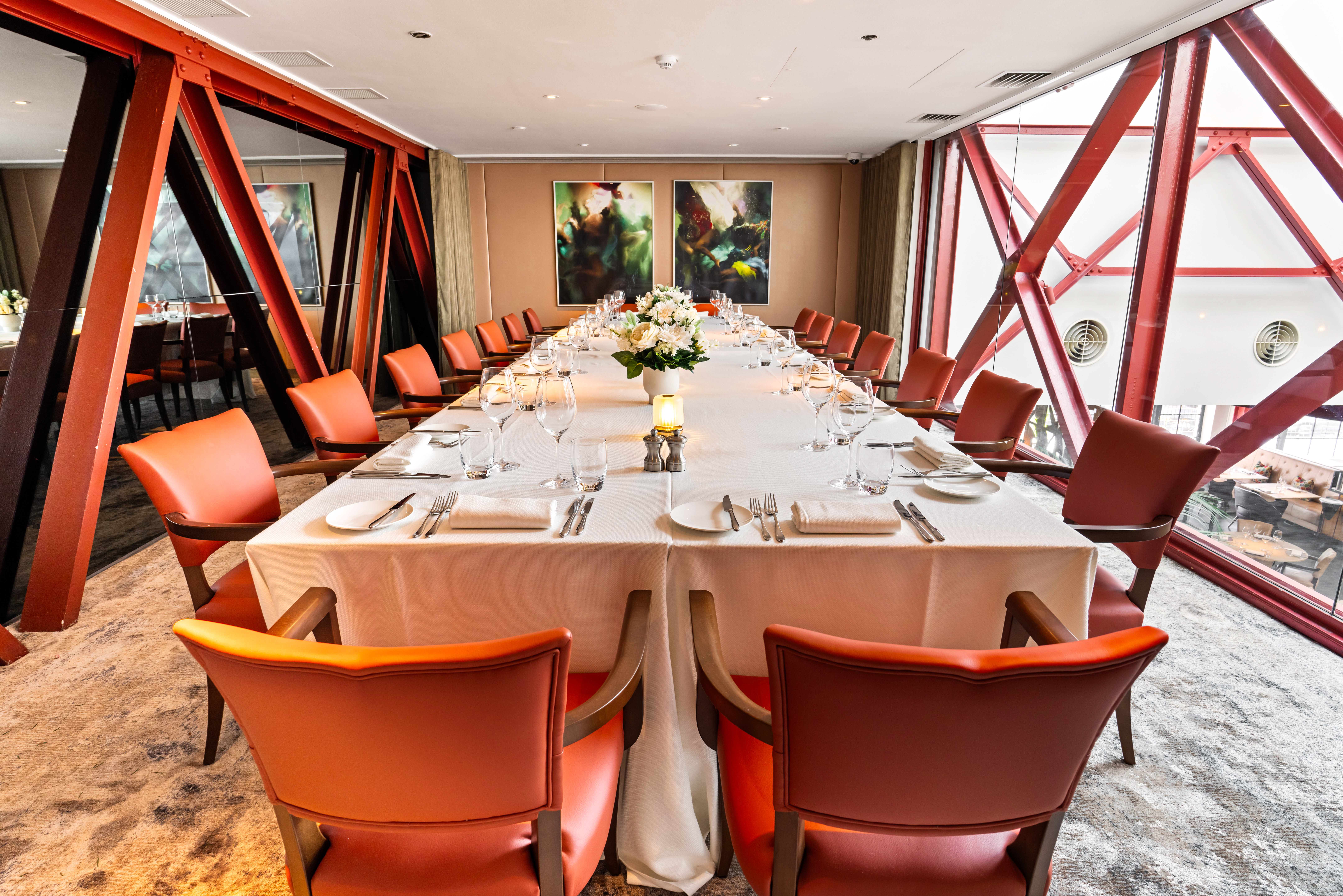 Elegant dining setup in Mezzanine Room, Bluebird Chelsea for corporate meetings and events.