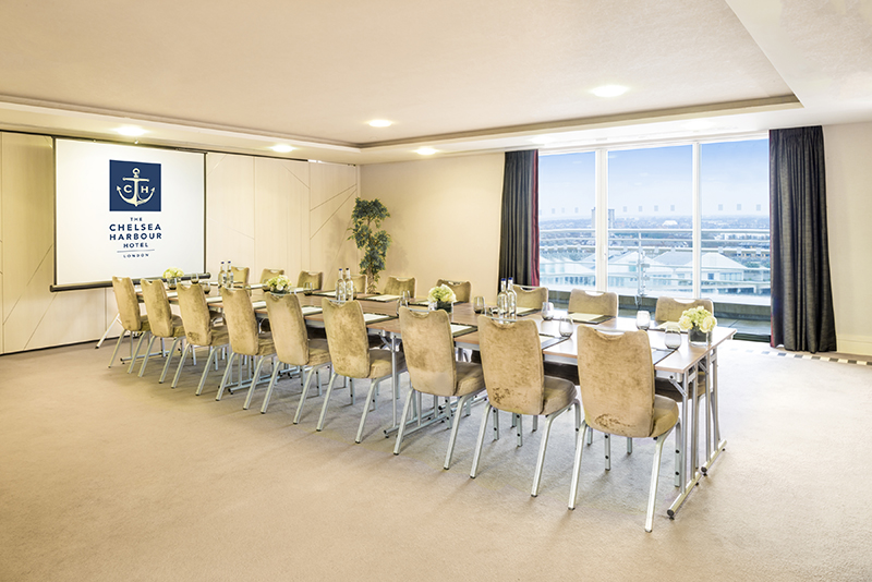 Battersea Suite meeting room with elegant table, ideal for corporate events and workshops.
