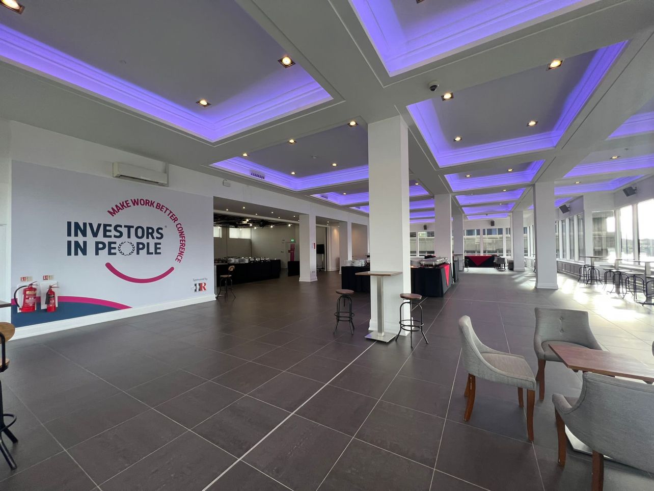 Upper River Room, modern event venue with natural light for corporate networking and presentations.