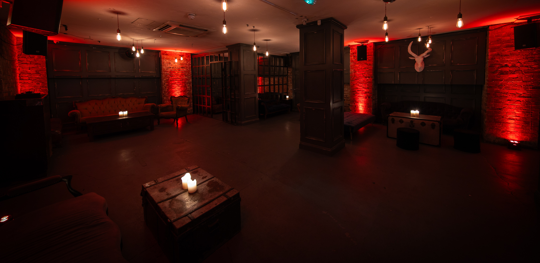 Whole Venue at Looking Glass Cocktail Club, cozy ambiance for intimate gatherings and events.