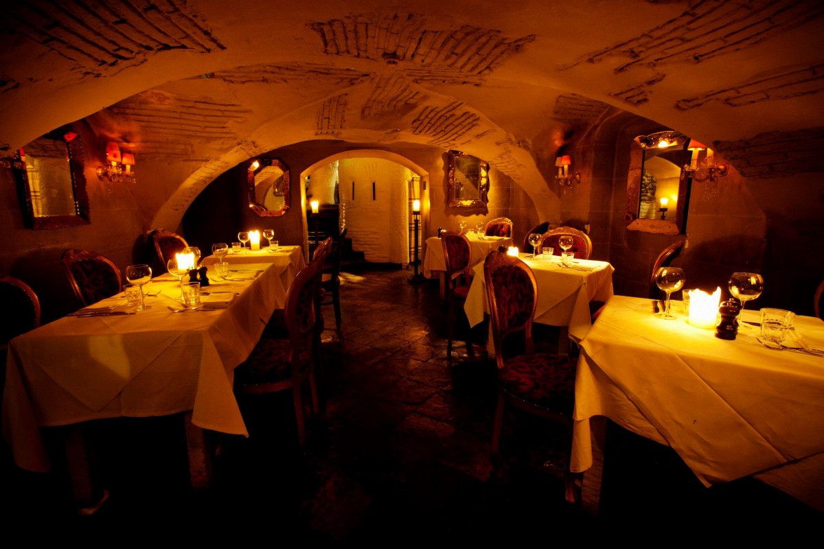 Intimate dining space in The Crypt, ideal for private events and exclusive dinners.