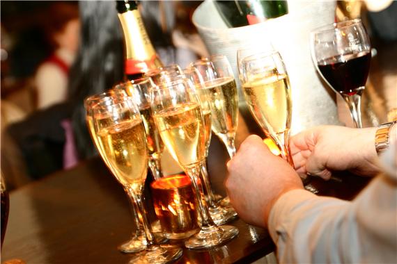 Elegant venue setup with champagne flutes for networking events and celebrations.