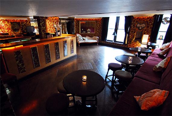 Intimate lounge at The Velvet Room, perfect for networking events and gatherings.