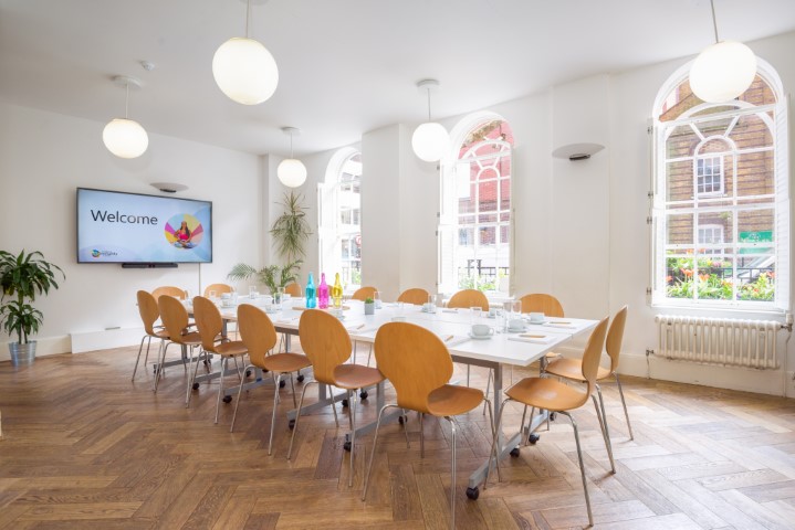 Bright Equiano Room in Fitzrovia Centre, ideal for meetings and events with modern design.