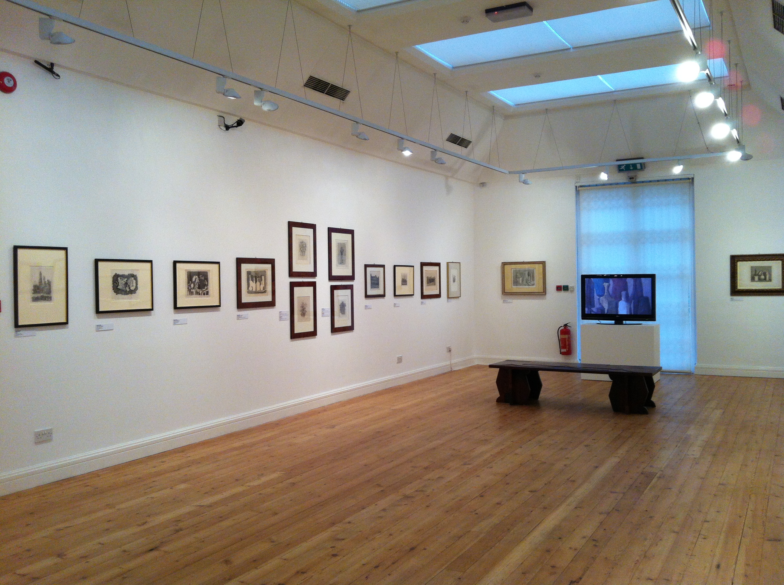 Estorick Collection gallery with framed artworks, ideal for art exhibitions and corporate events.