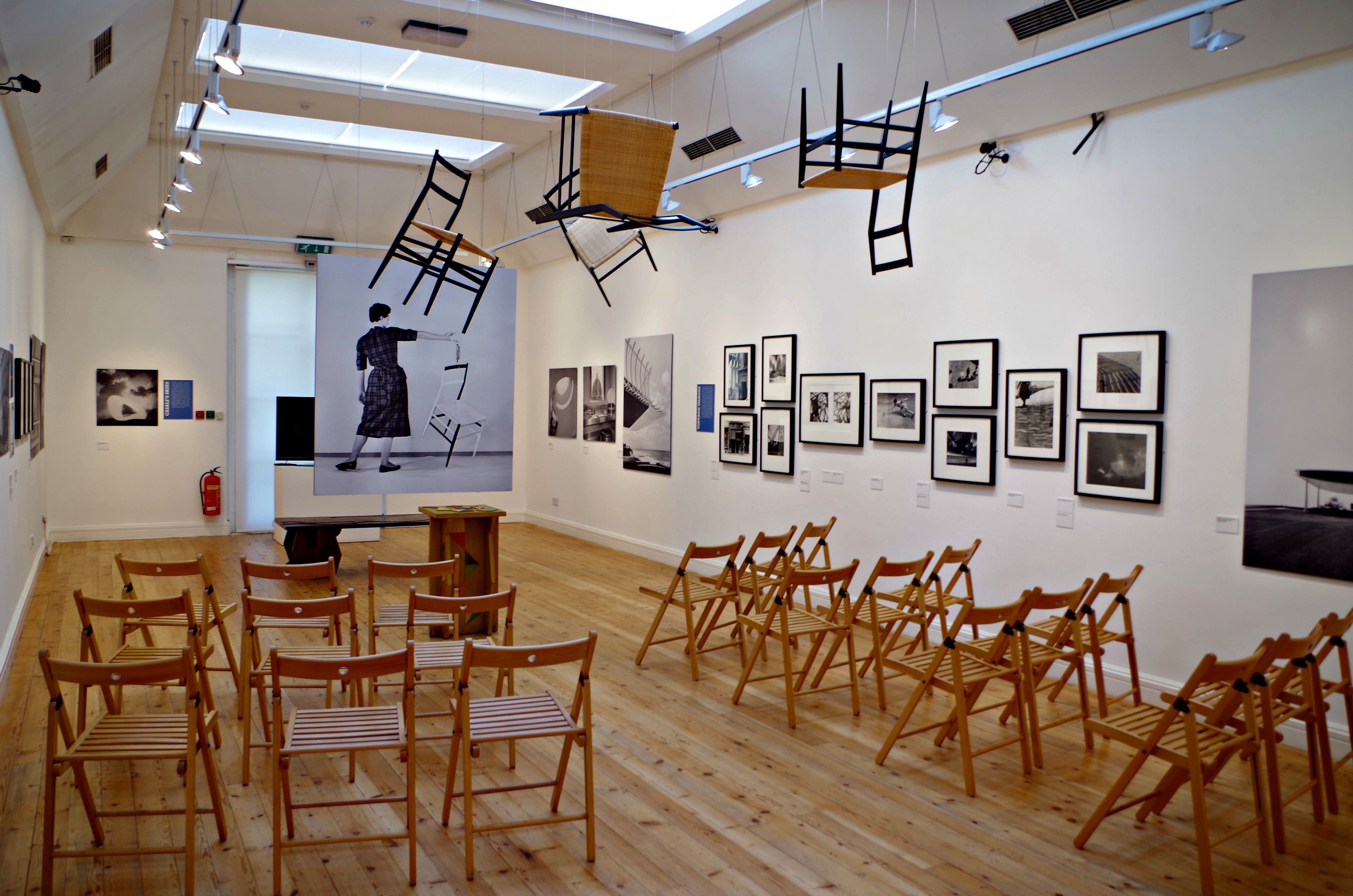 Event space in Estorick Collection with artwork, ideal for meetings and presentations.