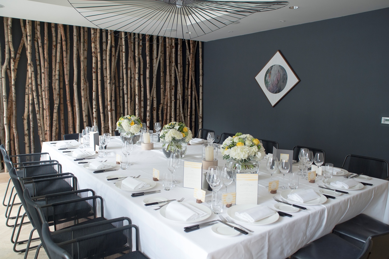 Elegant meeting space at South Place Hotel with floral decor for corporate events.