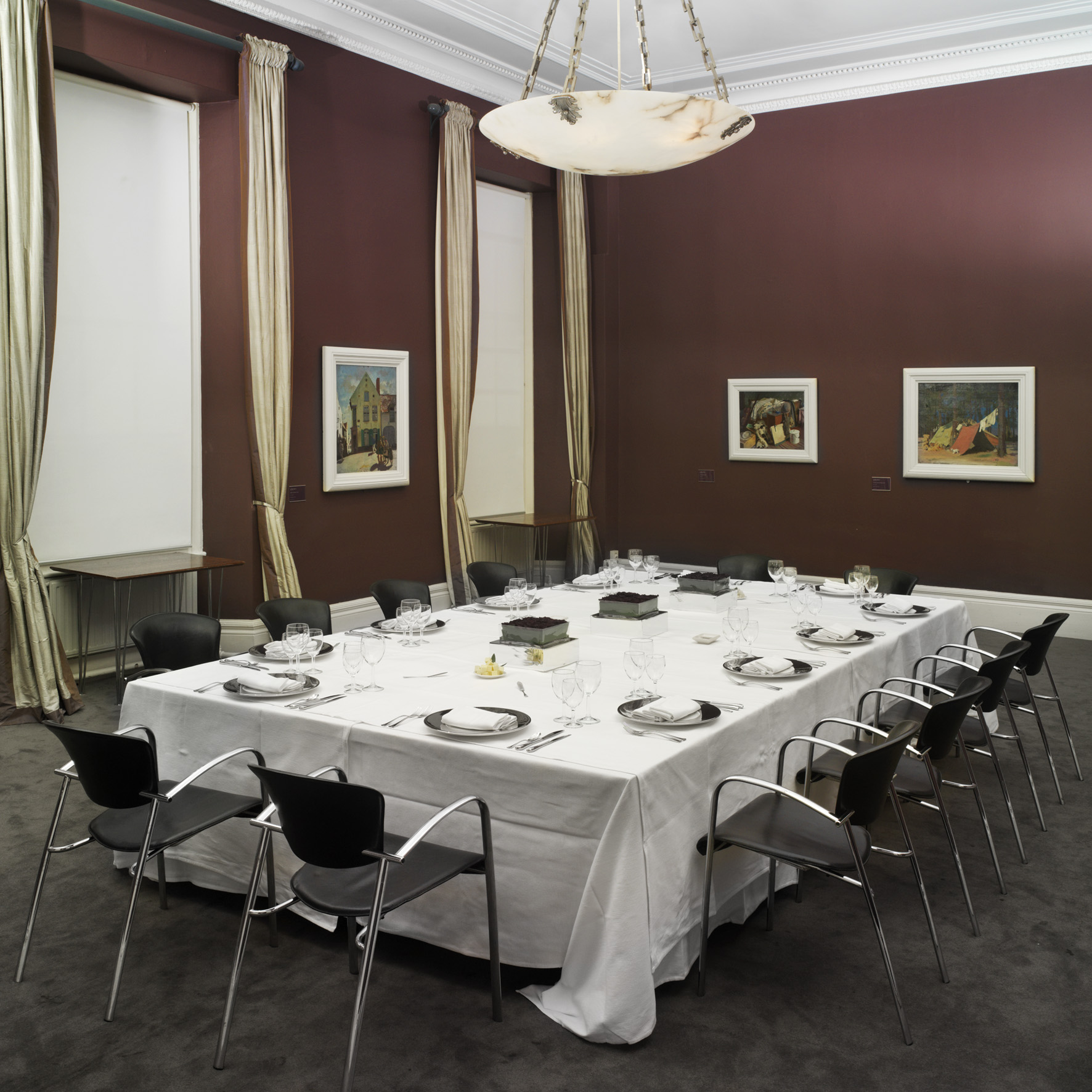 Orpen Boardroom at IWM London, elegant table setting for formal meetings and events.