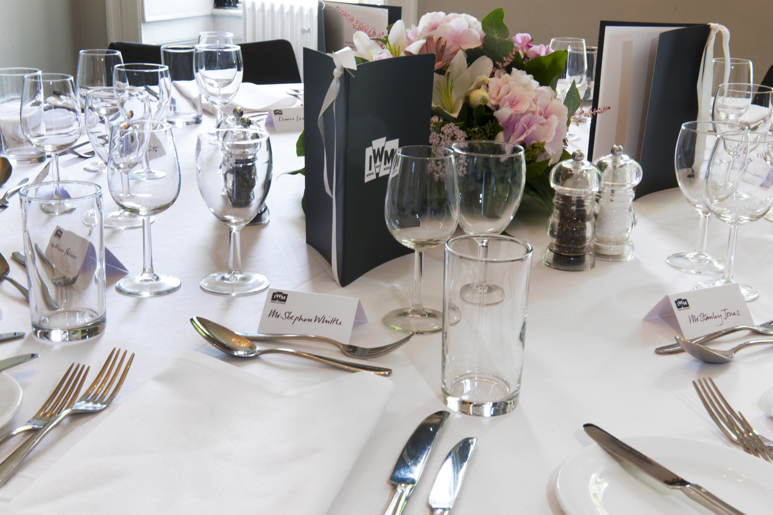 Elegant dining setup in Meeting Room 1, IWM London for professional events.