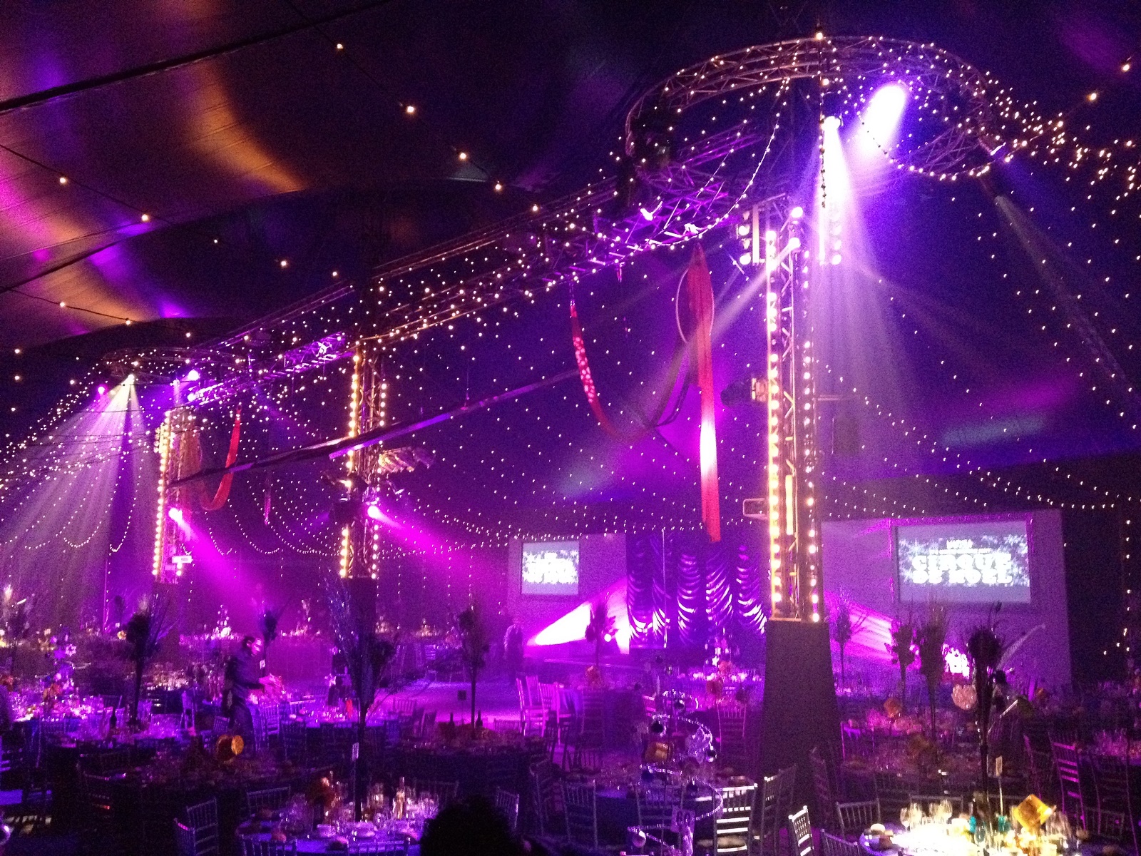 Cirque Shanghai event space with elegant decor and dramatic lighting for corporate gatherings.