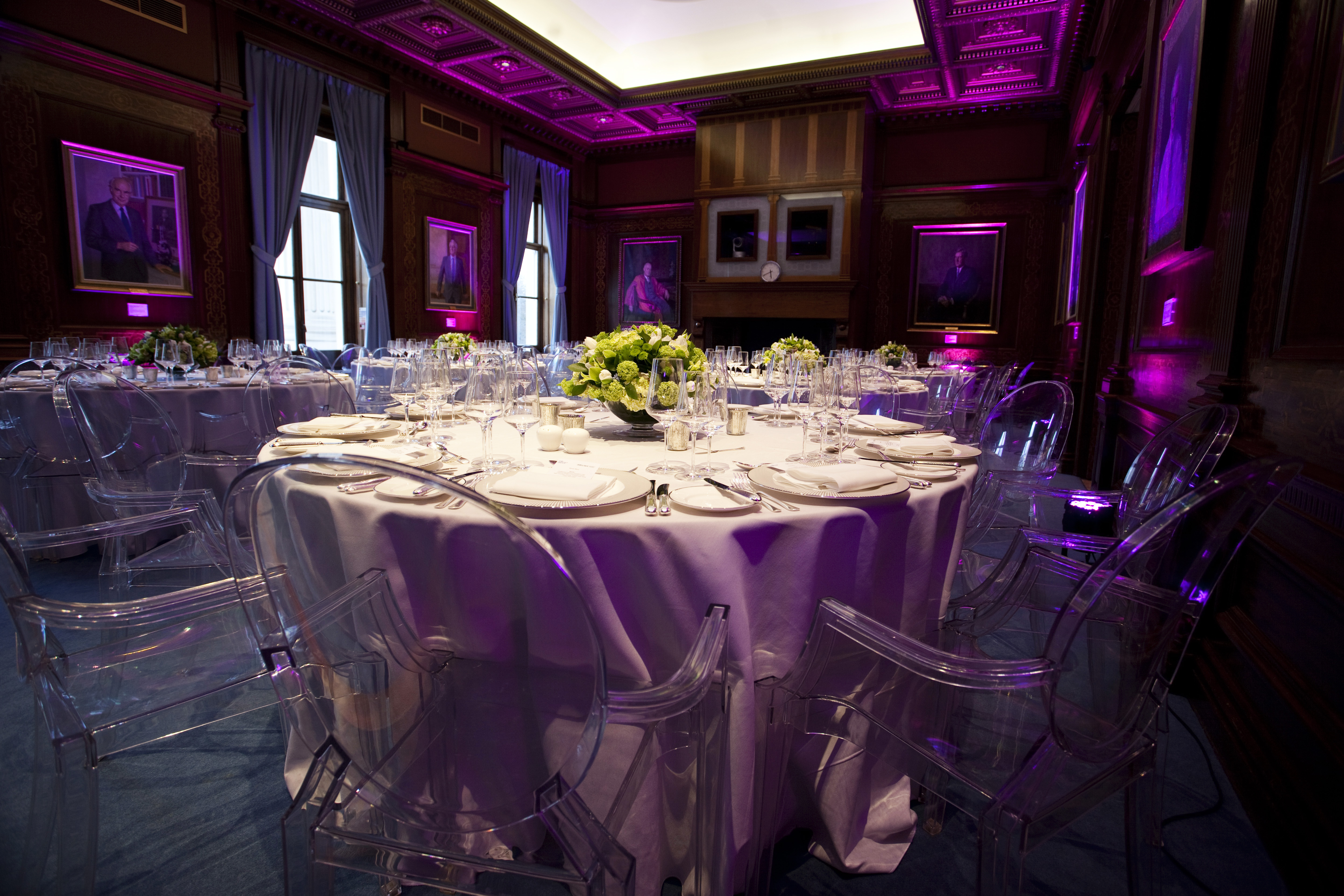 Elegant dining table with acrylic chairs at Kohn Centre, ideal for upscale events.