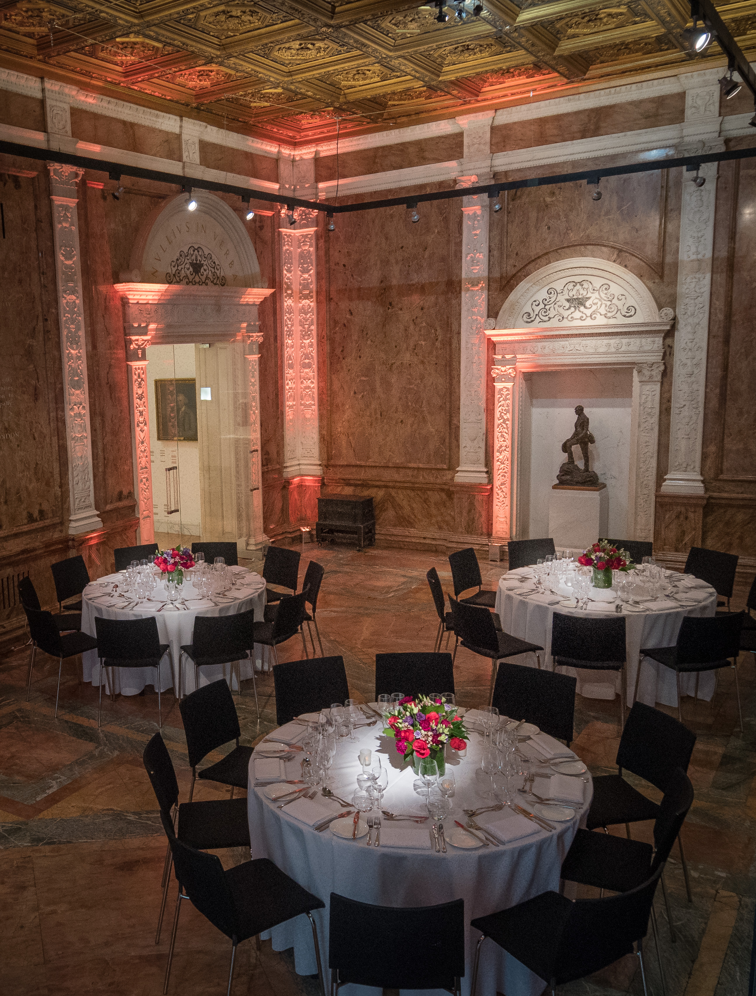 Kohn Centre & Marble Hall event space with floral centerpieces for upscale gatherings.