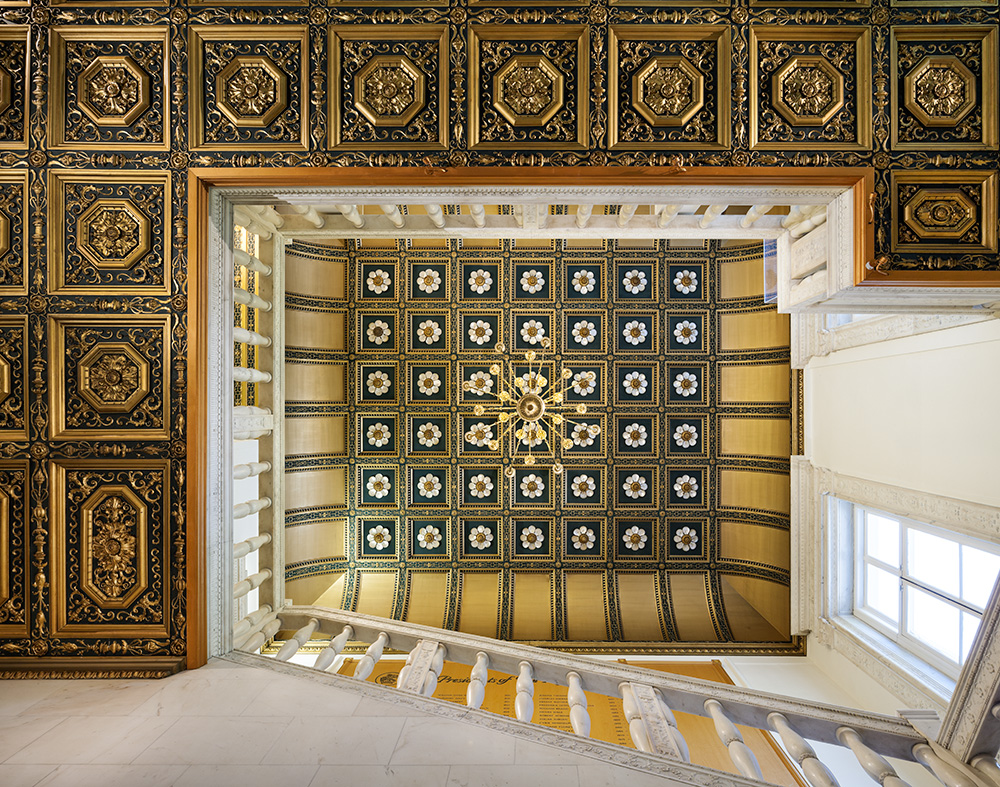 Ornate ceiling with gold detailing in The Royal Society, ideal for weddings and galas.