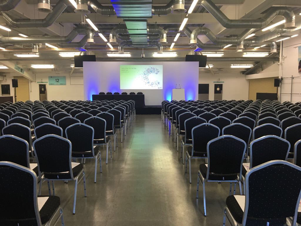 Jardine Suite at Kia Oval: spacious conference setup with black chairs for keynote events.
