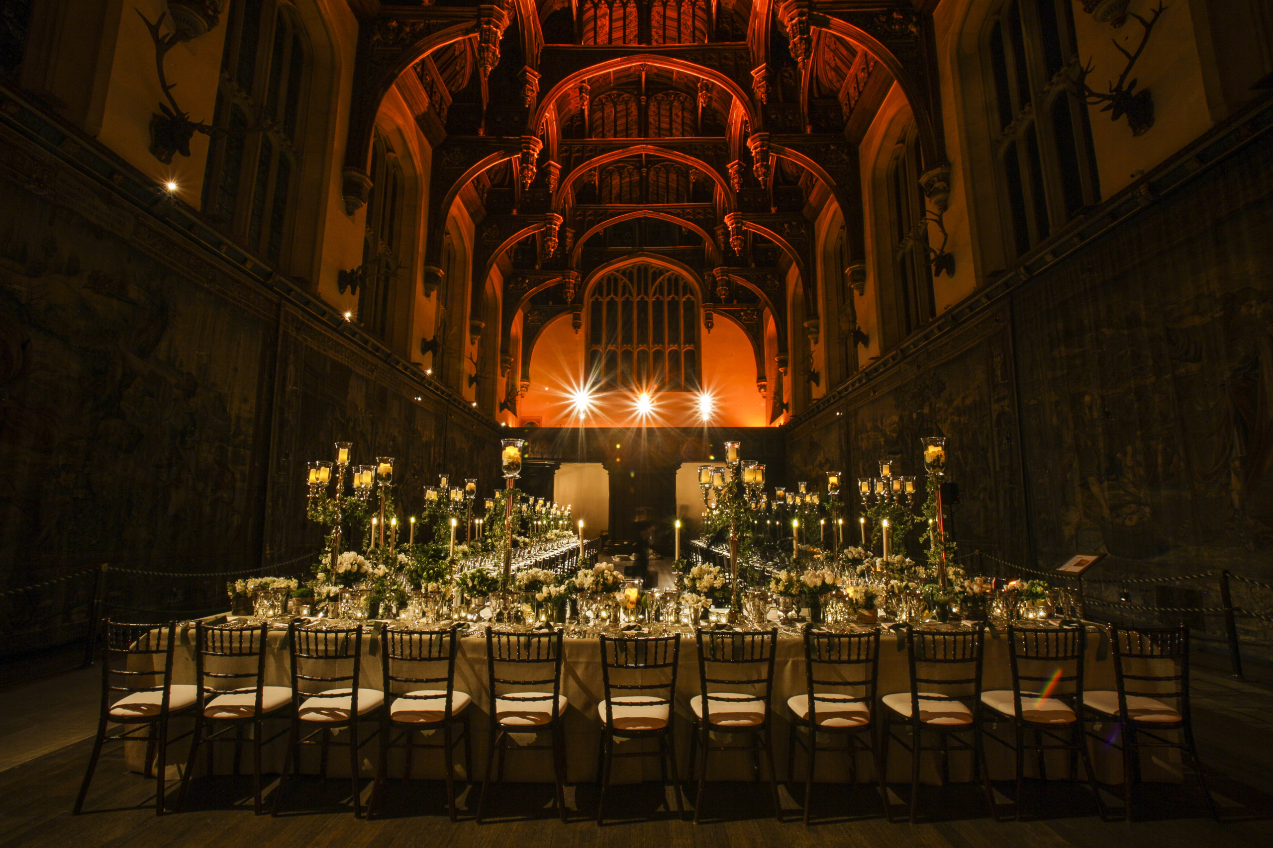 Elegant banquet setup in Hampton Court Palace's State Apartments for weddings and galas.