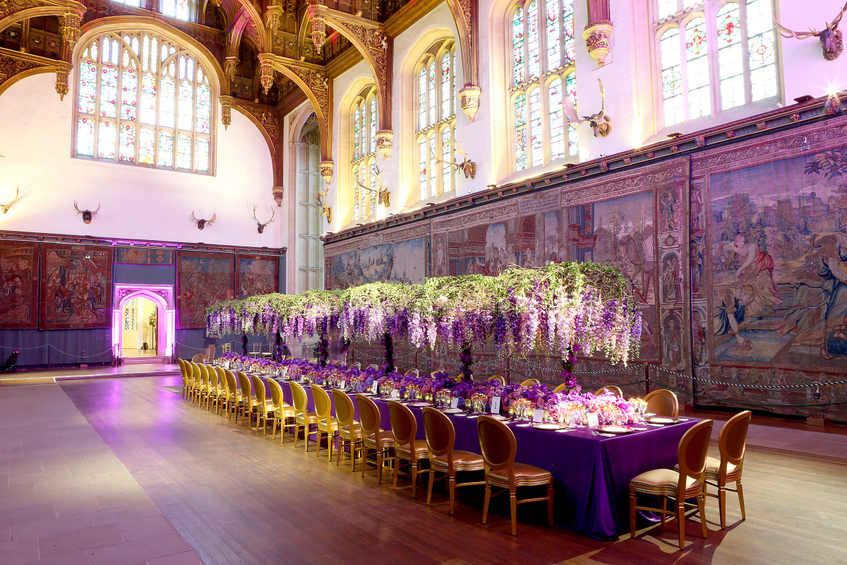 Elegant State Apartments at Hampton Court Palace with purple decor for upscale events.