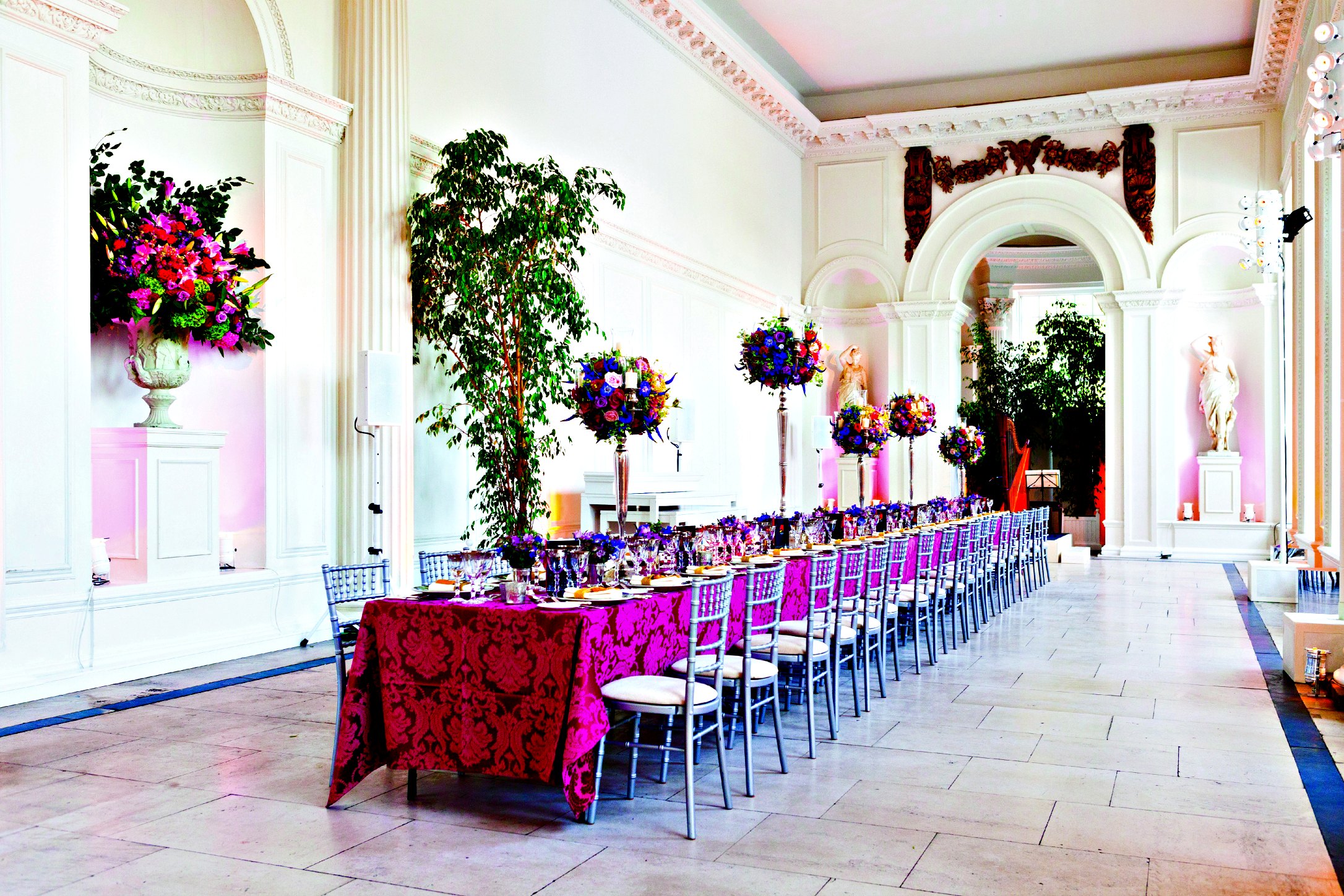 Elegant banquet table with floral arrangements at The Orangery, Kensington Palace for upscale events.