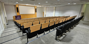 Cotton Theatre auditorium with tiered seating for conferences and presentations.