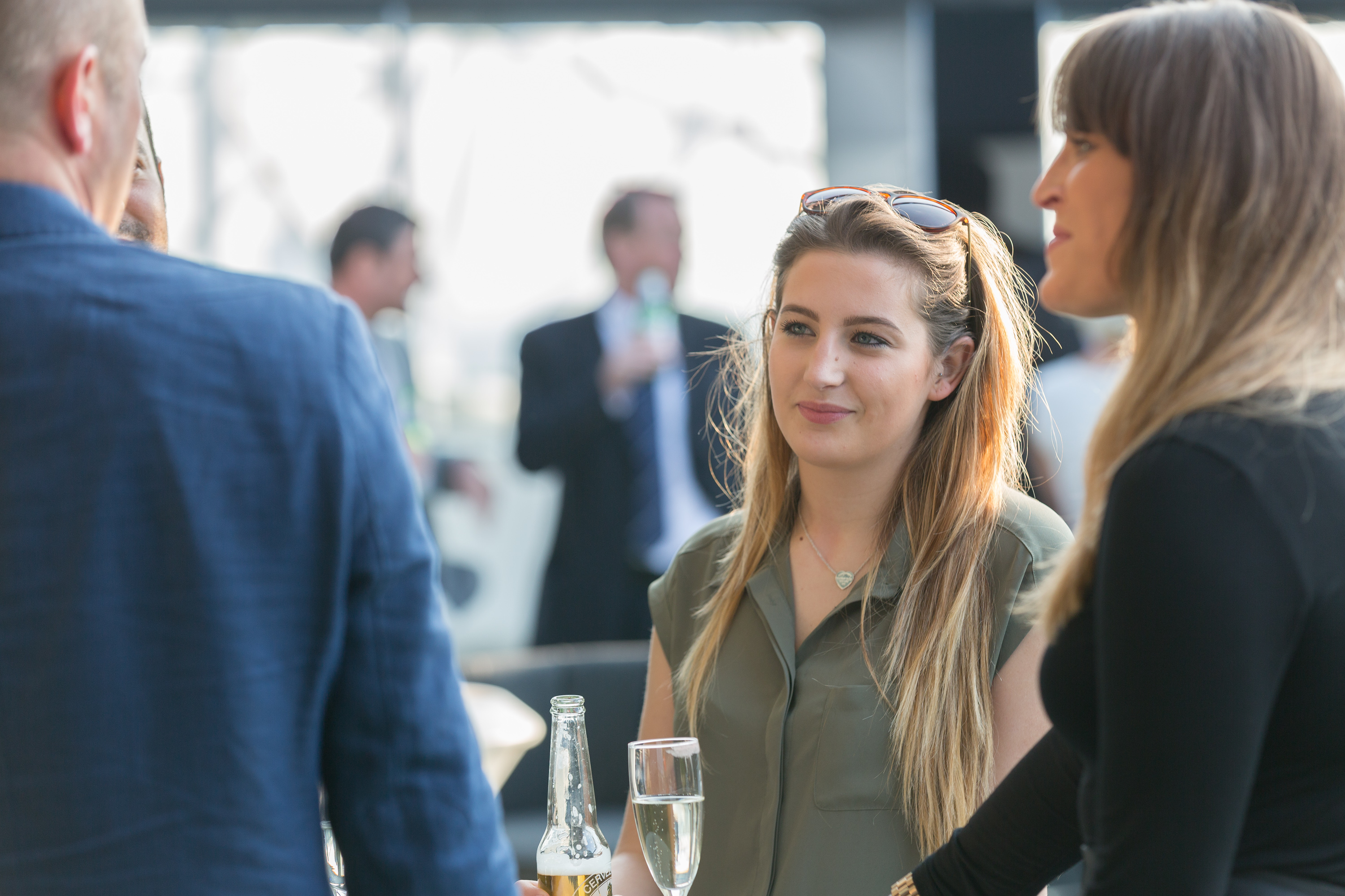 Networking event at Hotel Football with attendees in a modern, stylish setting.