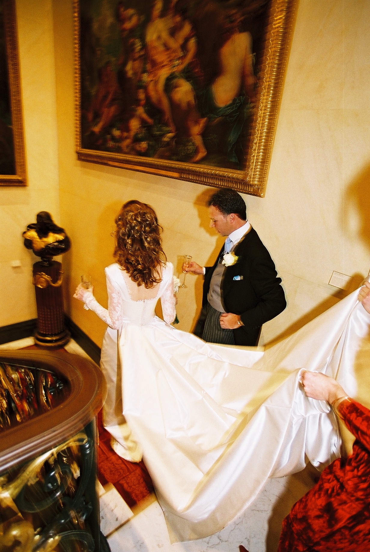 Couple at wedding in elegant Courtyard of The Wallace Collection, showcasing sophisticated ambiance.