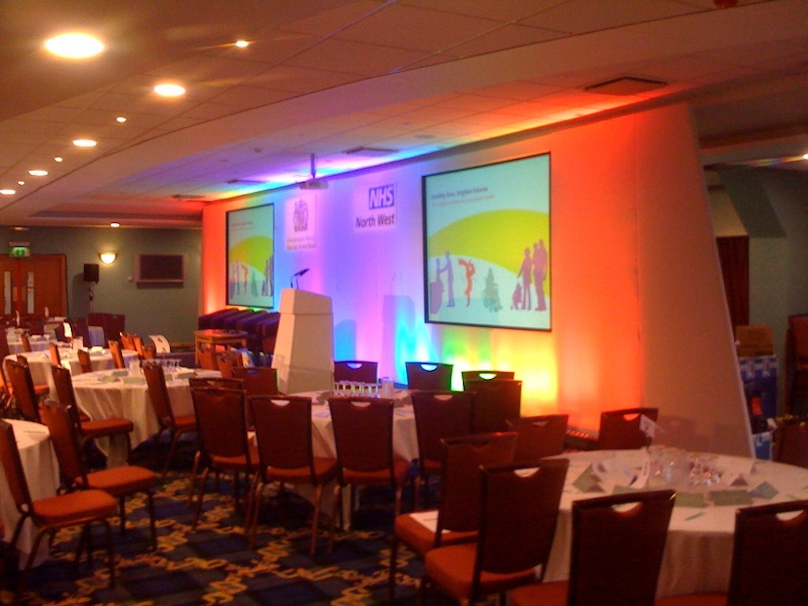 Platinum Suite at Bolton Whites Hotel, set for a vibrant conference with round tables.