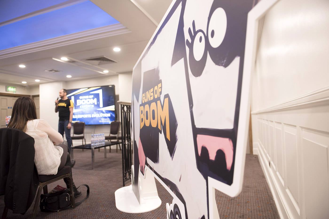 Dynamic event setup at The James Watt with speaker and playful cow branding.