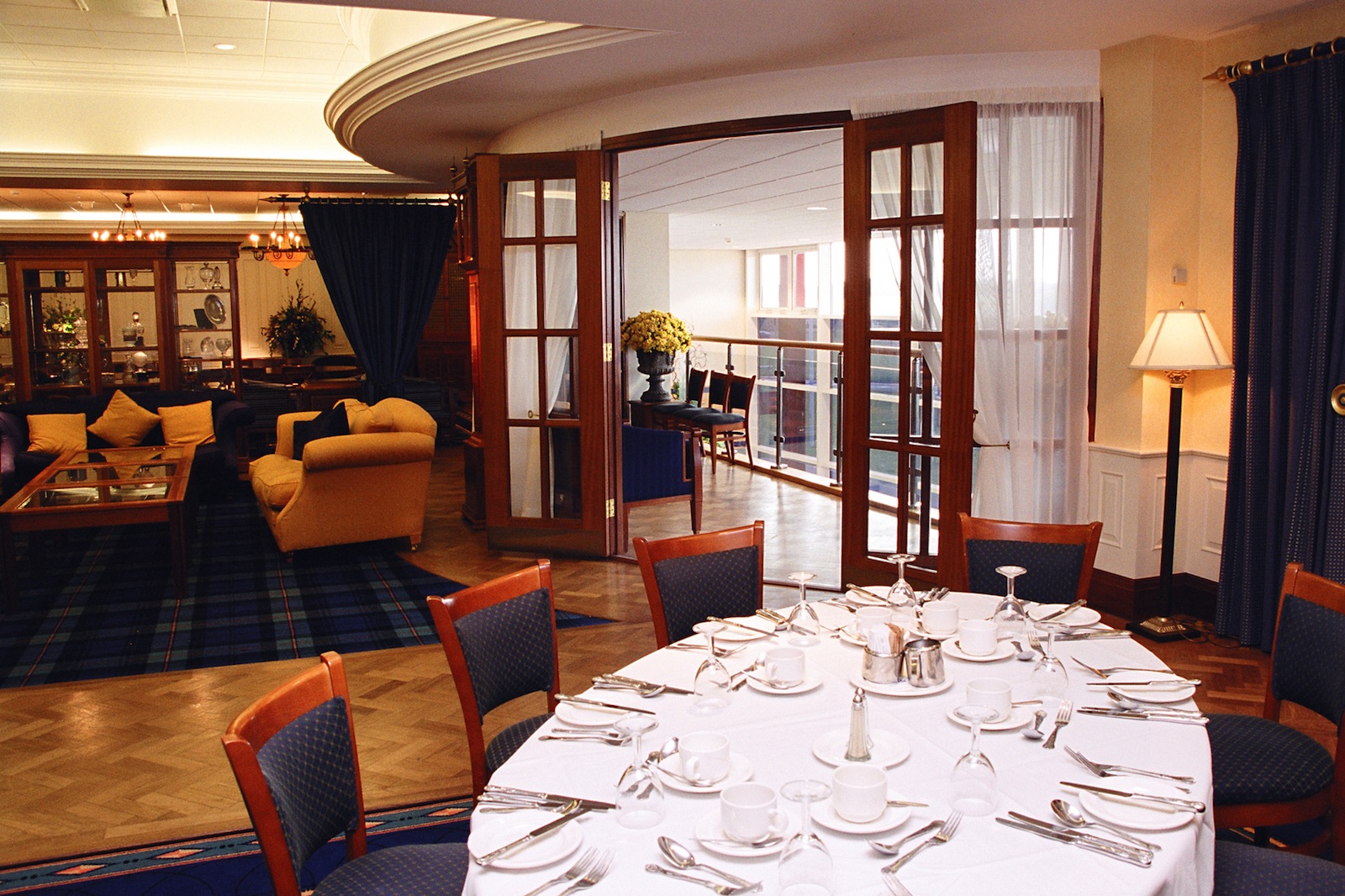 Chairman's Suite at Bolton Whites Hotel with elegant dining setup for events and gatherings.