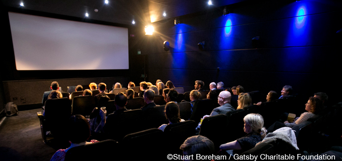 "Event in Rich Mix cinema with attendees in comfortable chairs, ideal for screenings and networking."
