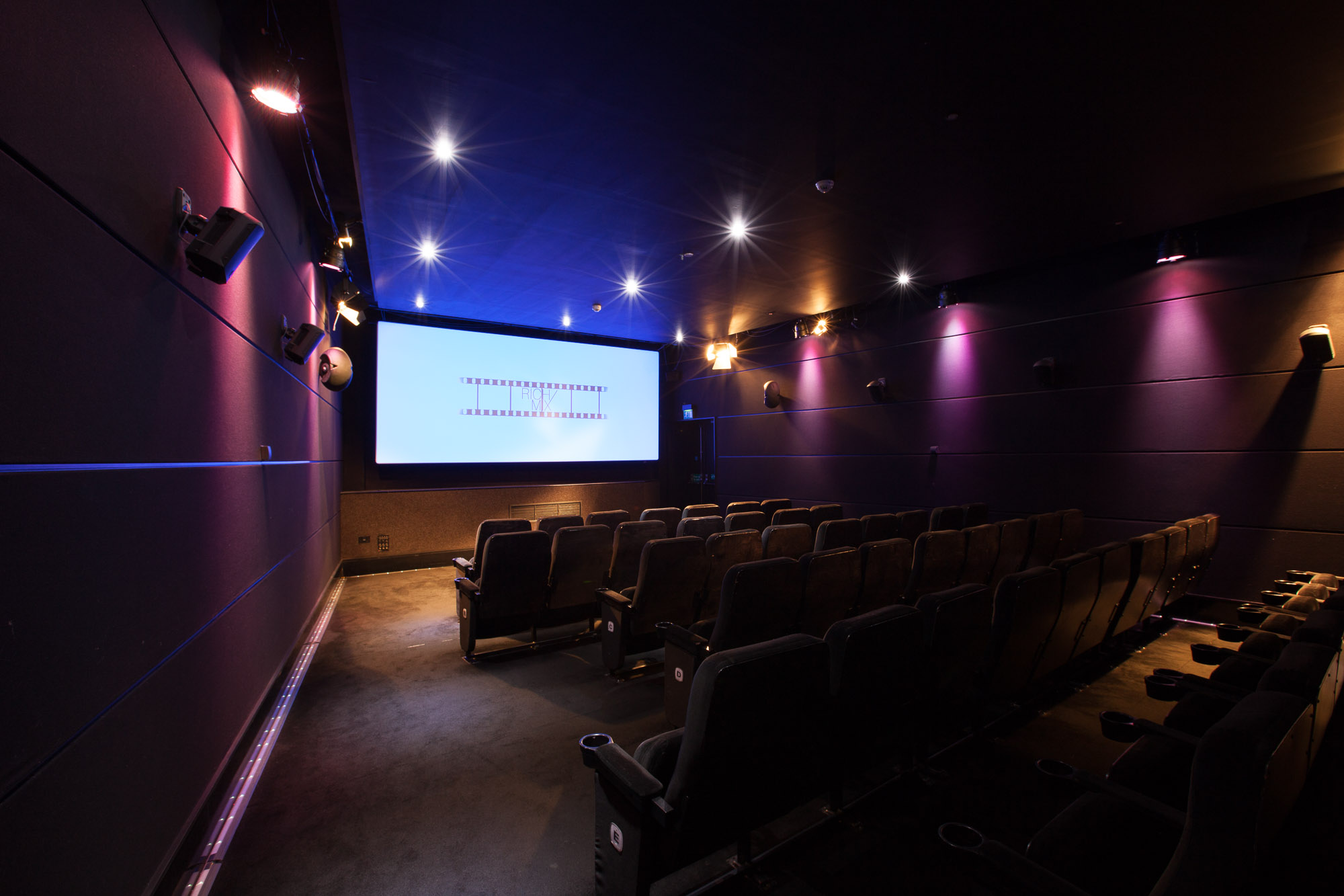 Modern screening room with sleek seating for film screenings and corporate events.