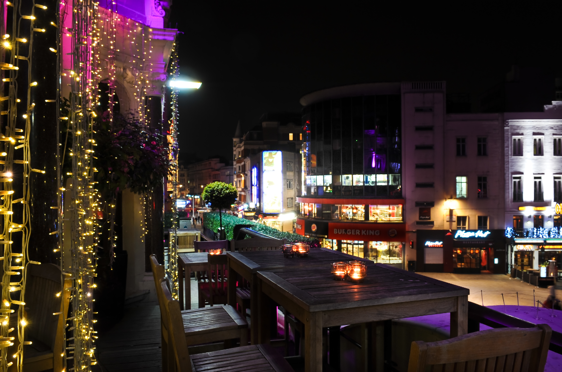 Vibrant outdoor venue at Ruby Blue, perfect for evening networking events and gatherings.