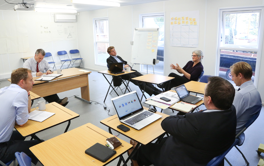 Seminar room at The AHOY Centre with professionals collaborating in a productive environment.
