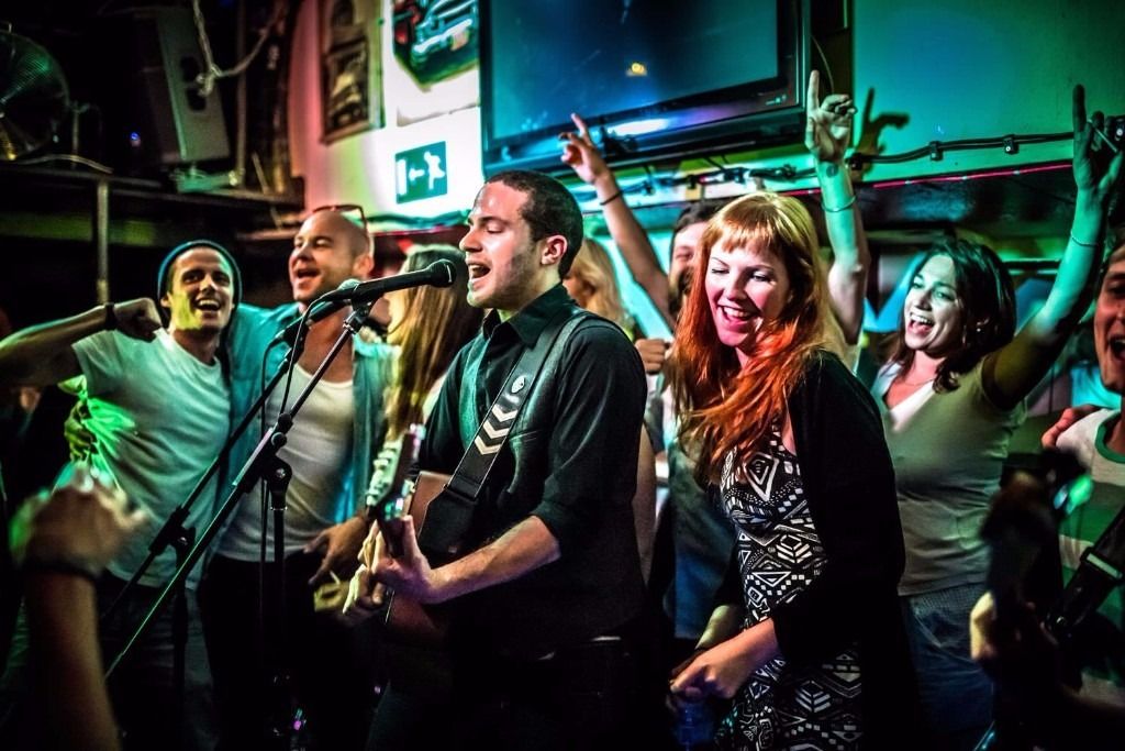 Vibrant live music event at The Lower Deck, Tamesis Dock, perfect for networking.