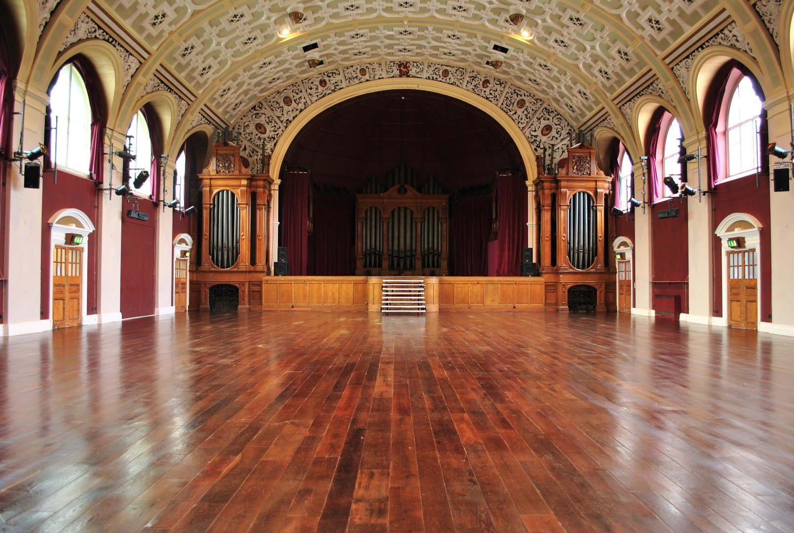 Grand Hall at Battersea Arts Centre: elegant venue with ornate stage, ideal for concerts and receptions.