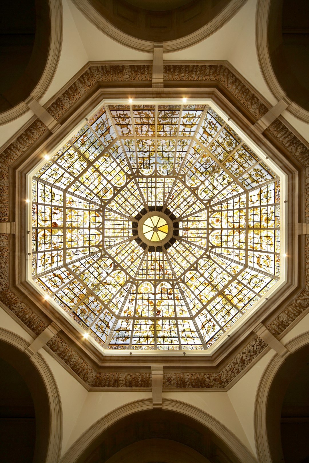 Stunning stained glass ceiling in Battersea Arts Centre's Grand Hall for upscale events.
