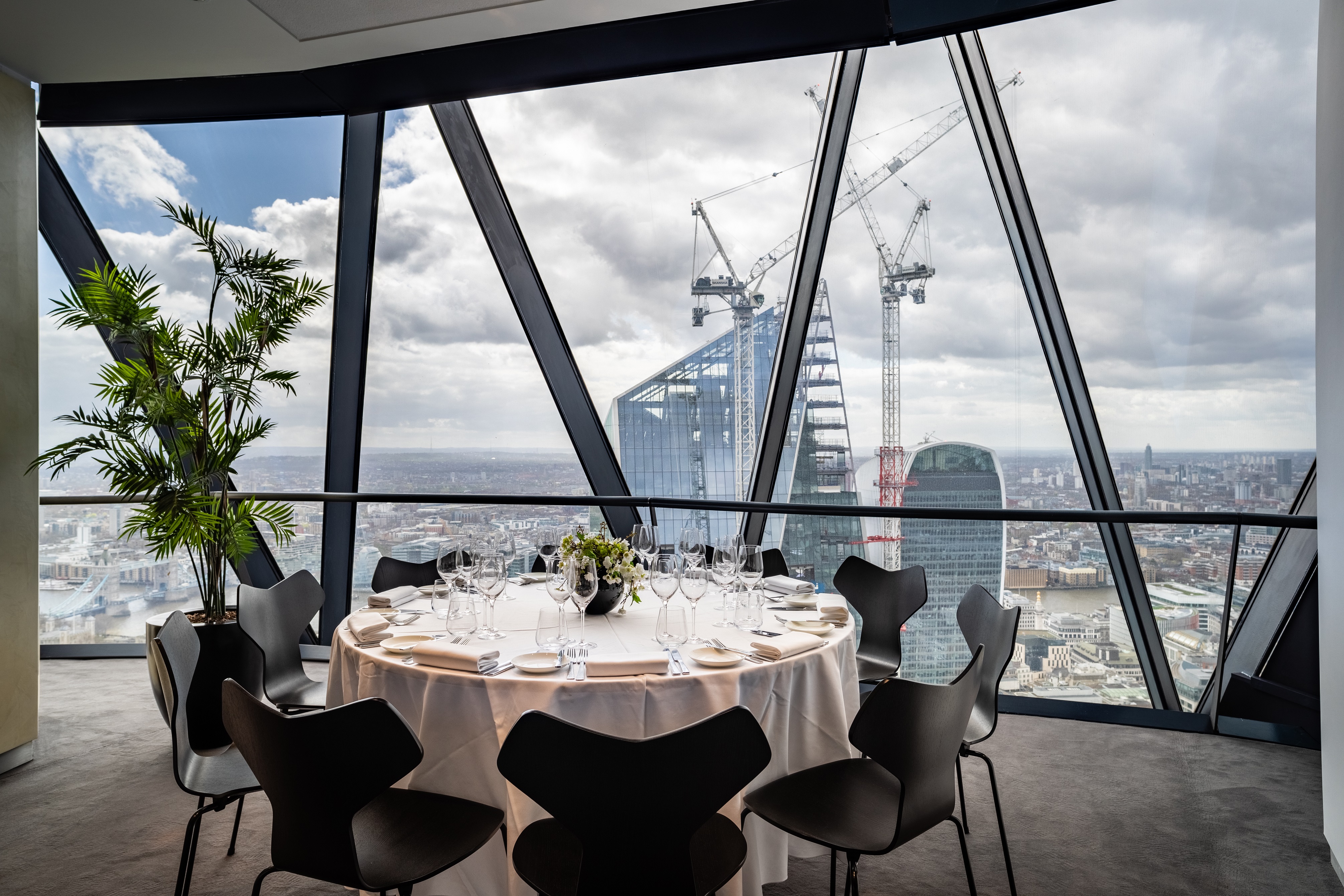 Elegant dining room with city views for high-profile events at Searcys, Gherkin.