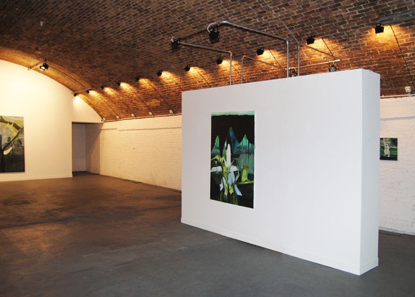 Spacious minimalist gallery with exposed brick for art exhibitions and corporate events.