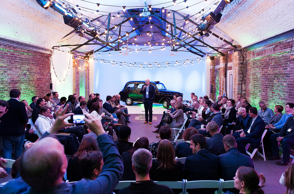 Event space in Shoreditch with speaker, vintage car, ideal for product launches.