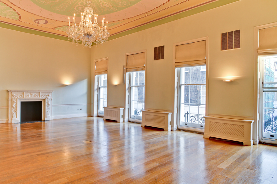 Elegant meeting room with large windows, ideal for corporate events and gatherings.