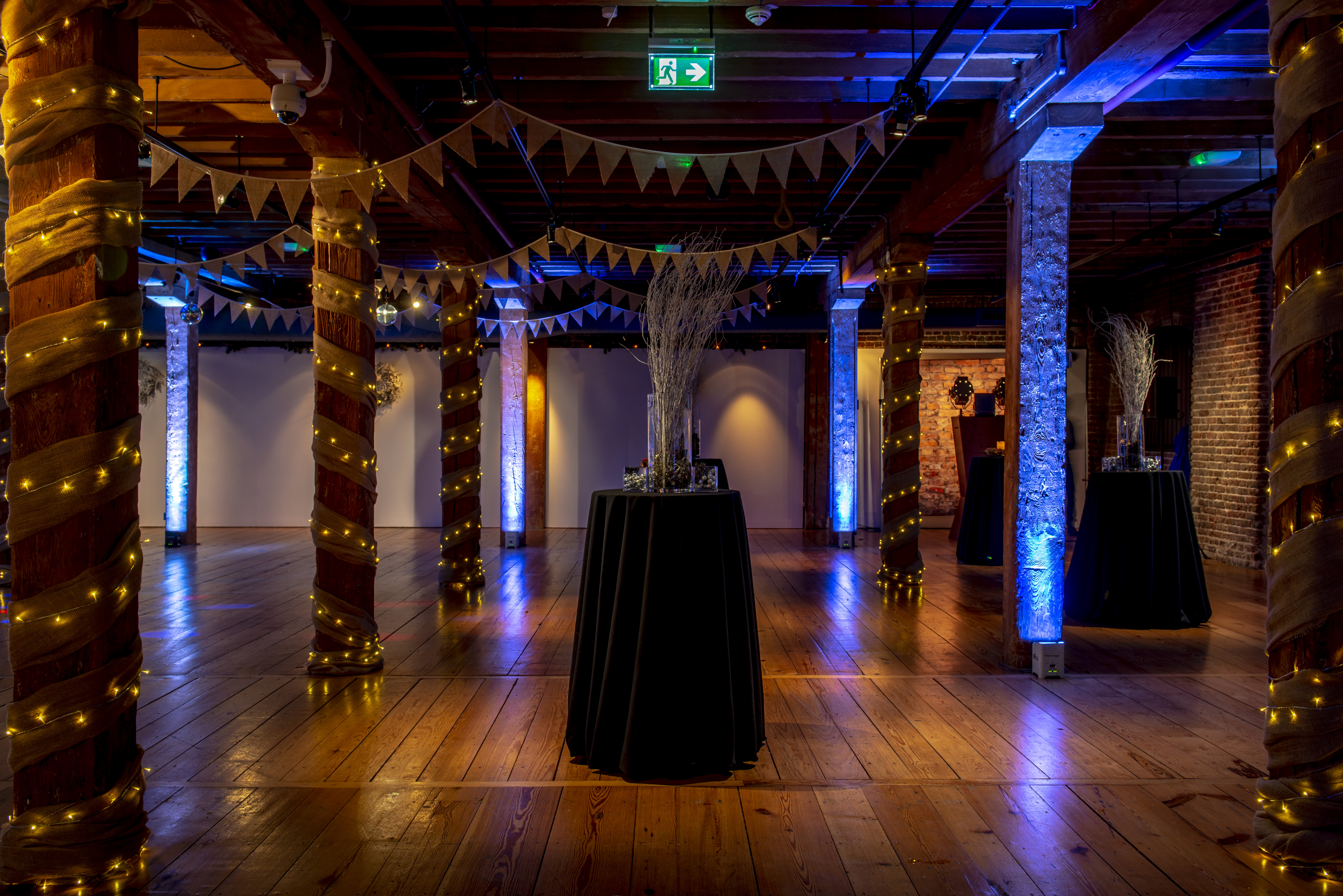 Sugar Store event space in London Docklands with rustic decor, ideal for celebrations.