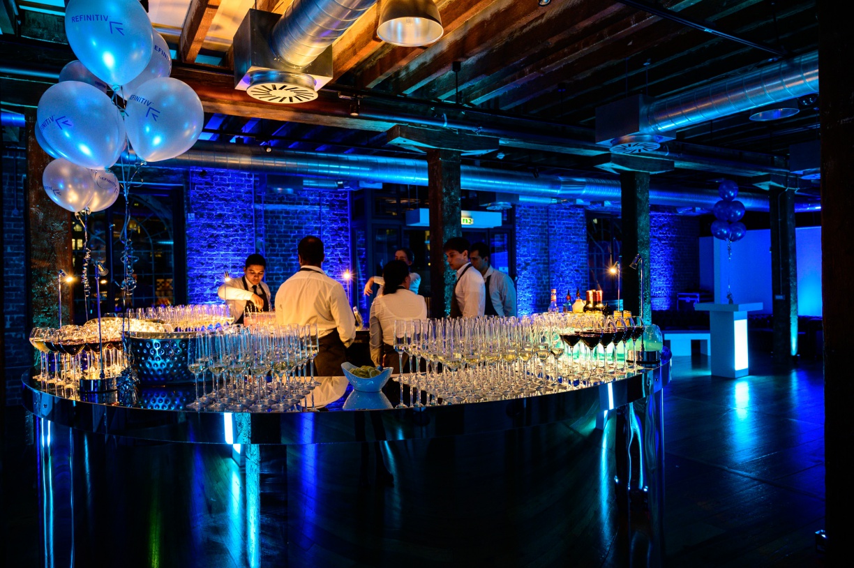 Stylish Rum Store event space with illuminated bar, ideal for cocktail receptions.