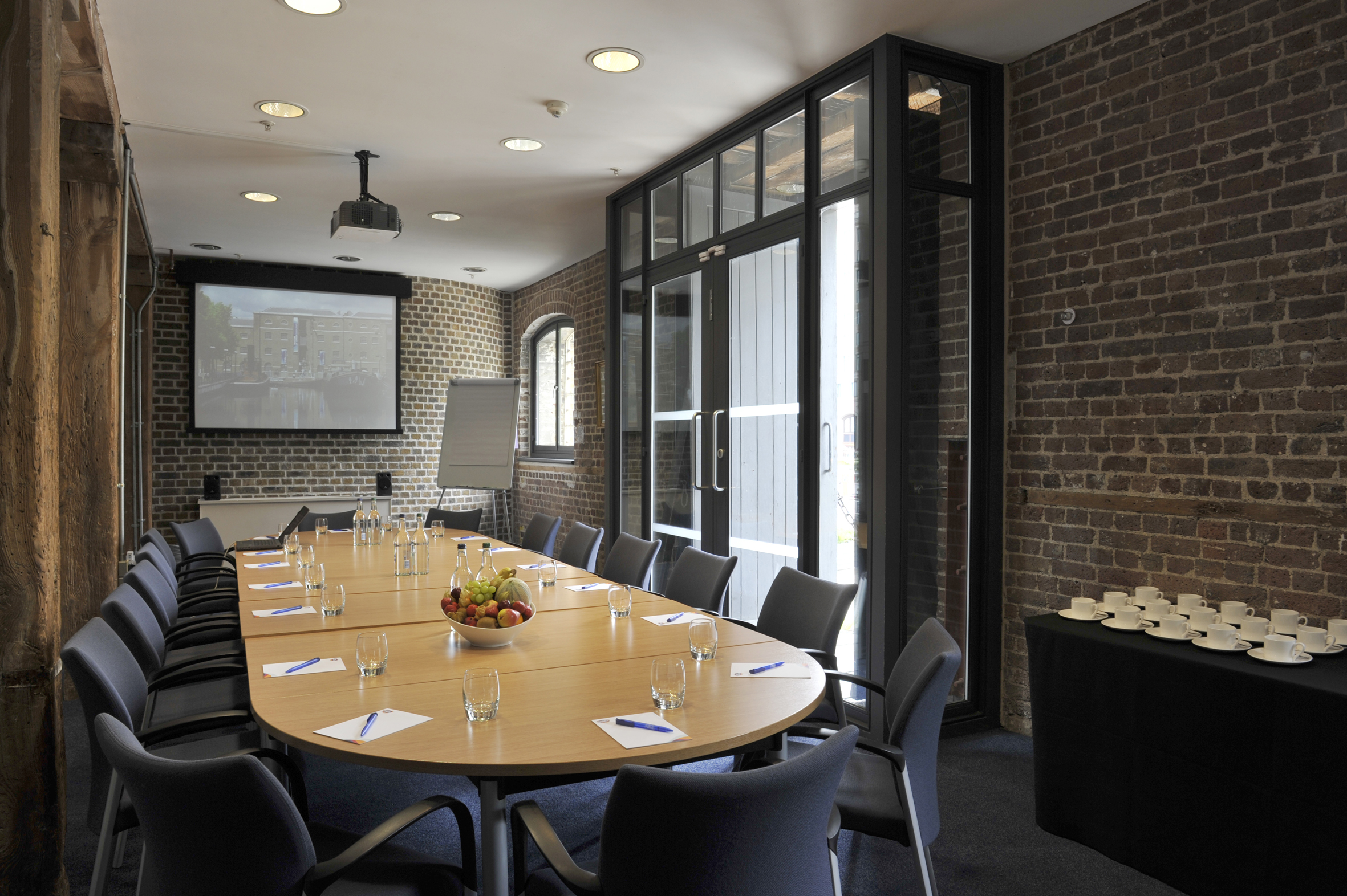 Docklands Boardroom with oval table, ideal for professional meetings and presentations.