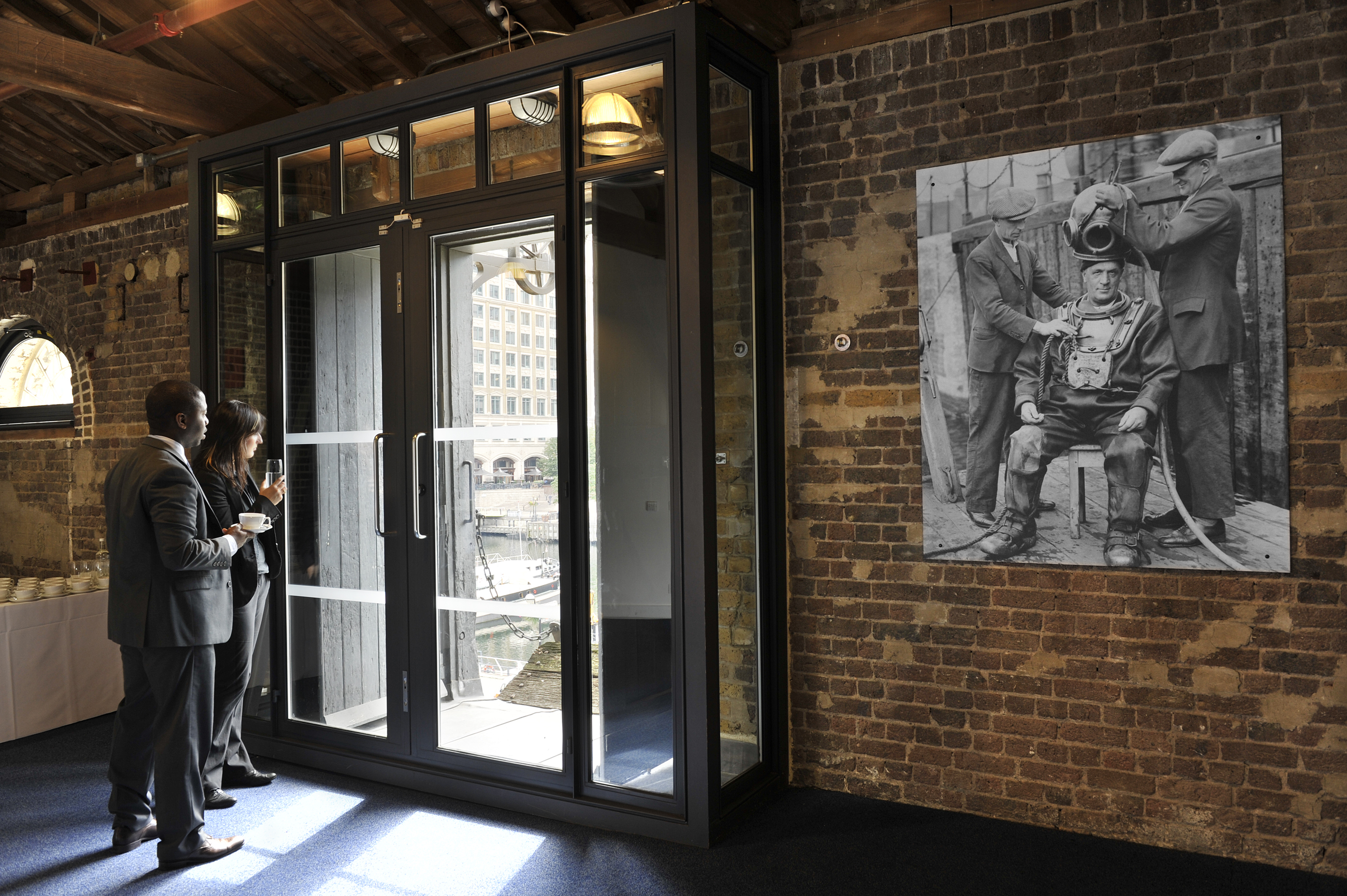 Modern Quayside Room at London Museum Docklands, ideal for networking events.